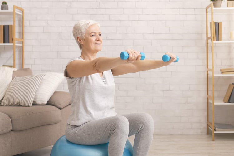 Senior woman exercising as a way to make her immune system stronger.