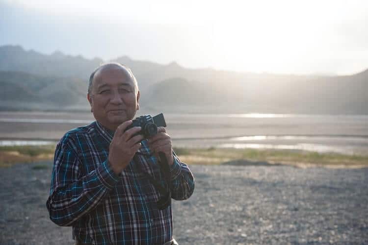 A man enjoying his photography passion during retirement.