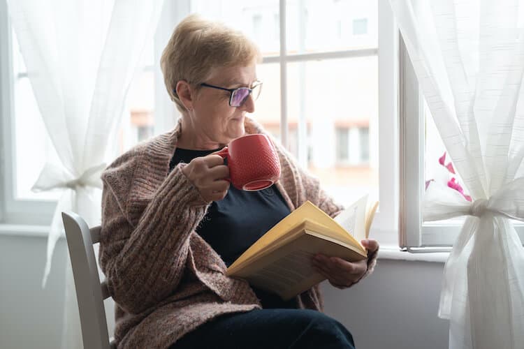 A senior woman safe and happy in her home.