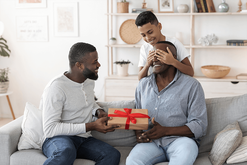 Son and grandson surprise grandpa with a gift