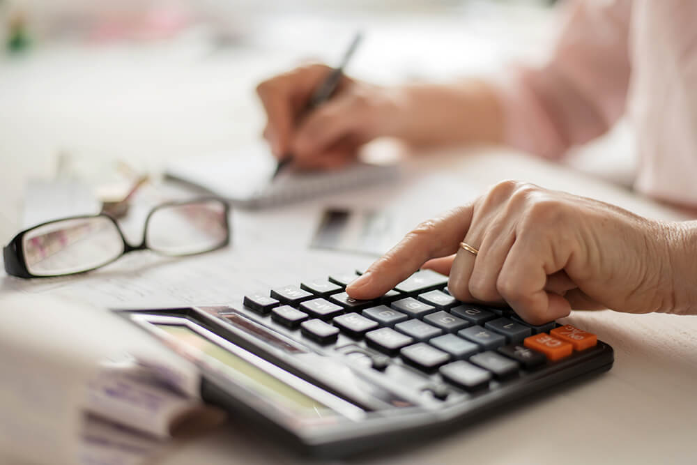 person using calculator