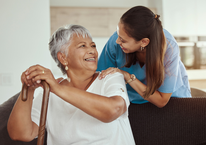 Senior sharing moment with care giver