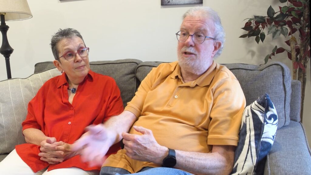 Seniors talking on couch