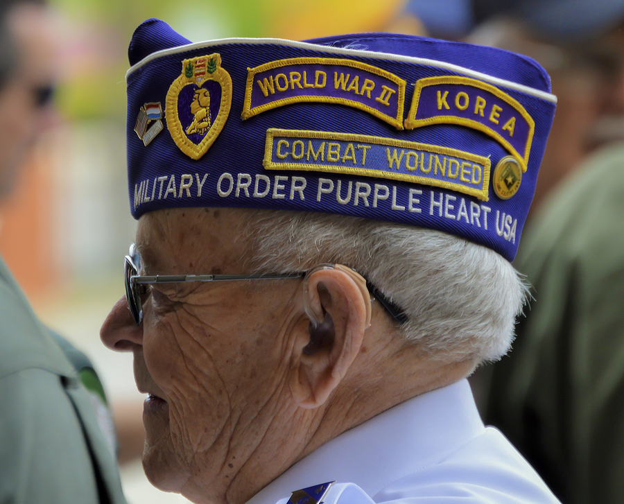 Veteran being recognized for his service in WWII and Korea on Veterans Day