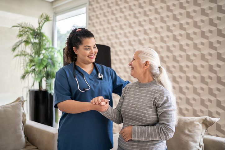 Senior sharing a moment with her caregiver