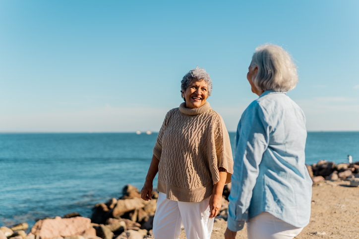 Two senior women friends visit the Jersey Shore in the springtime